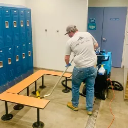 Janitorial Services being performed in a fitness center locker room.